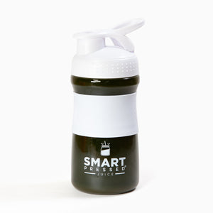 1  Smart Pressed Juice white water jug filled with green smoothie inside against a white background.